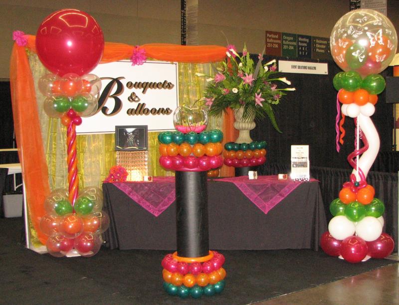 Bouquets & Balloons tradeshow booth with flowers and balloons